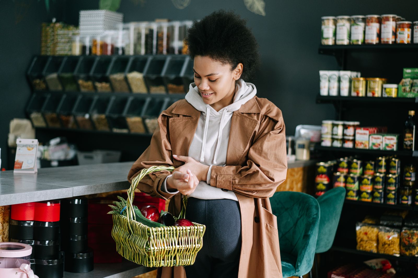 Pregnant person shopping for fresh produce