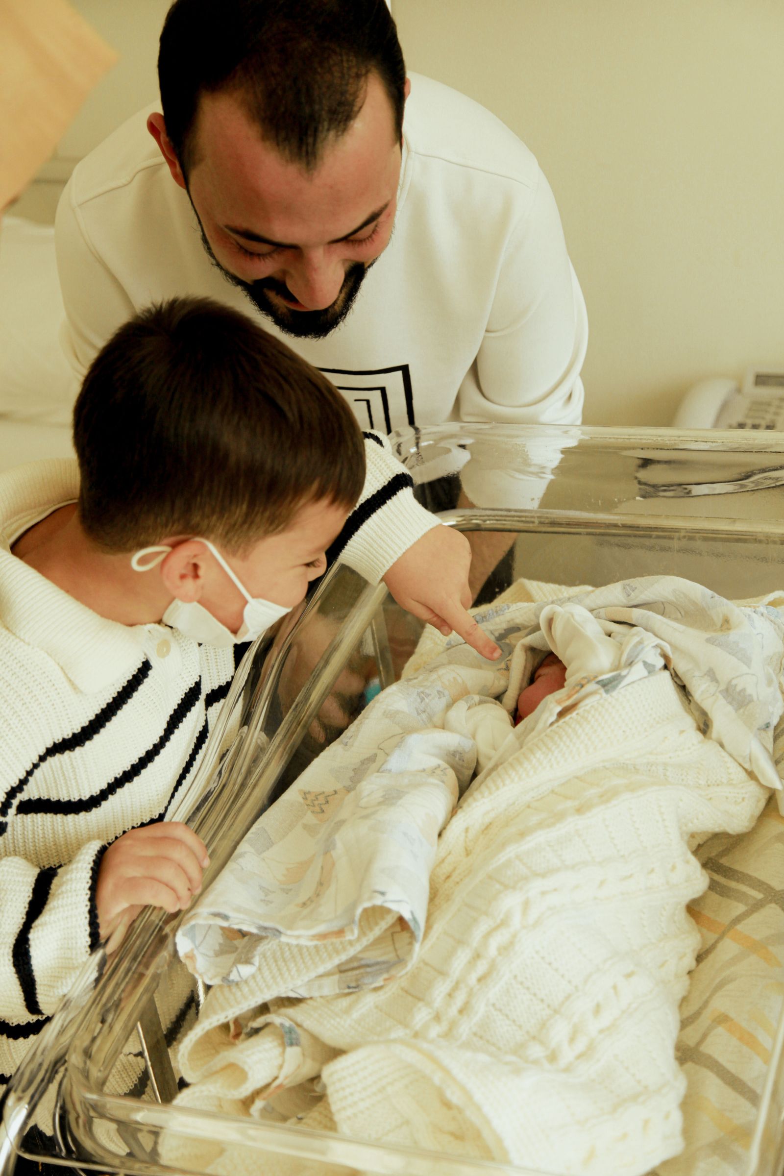 Family care moment with a newborn baby